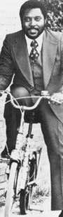 Why on earth is Jimmie riding a bike on this publicity shot?